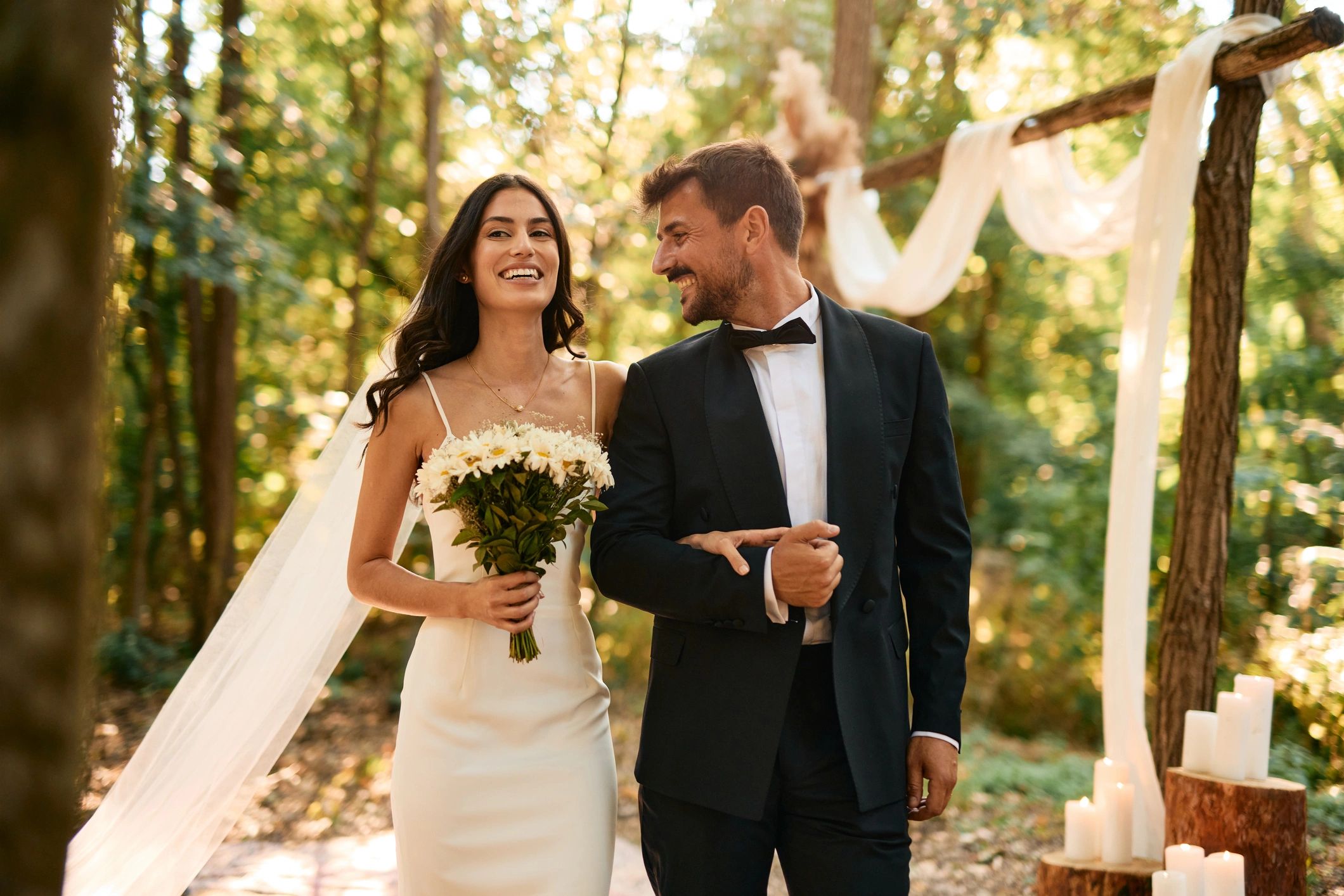 Couple walking down the aisle at an outdoor wedding